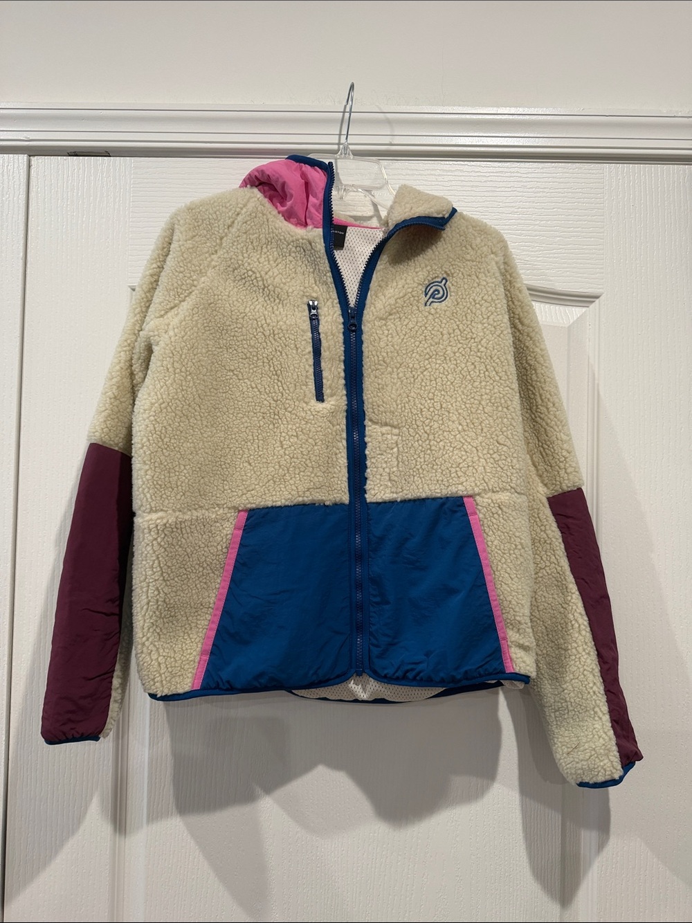 Peloton Cream Sherpa Jacket with Blue Pockets, Pink Trim & Maroon Sleeves